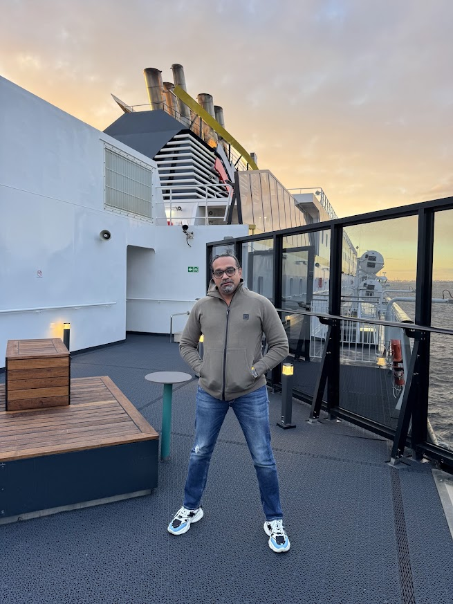 Girish travelling by ferry across the Baltic